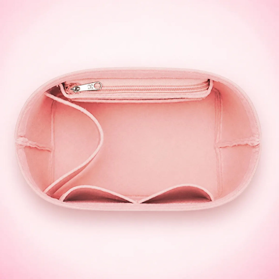 Pink Mirieth Organised Bag Insert, overhead view showing the zip pocket and compartments